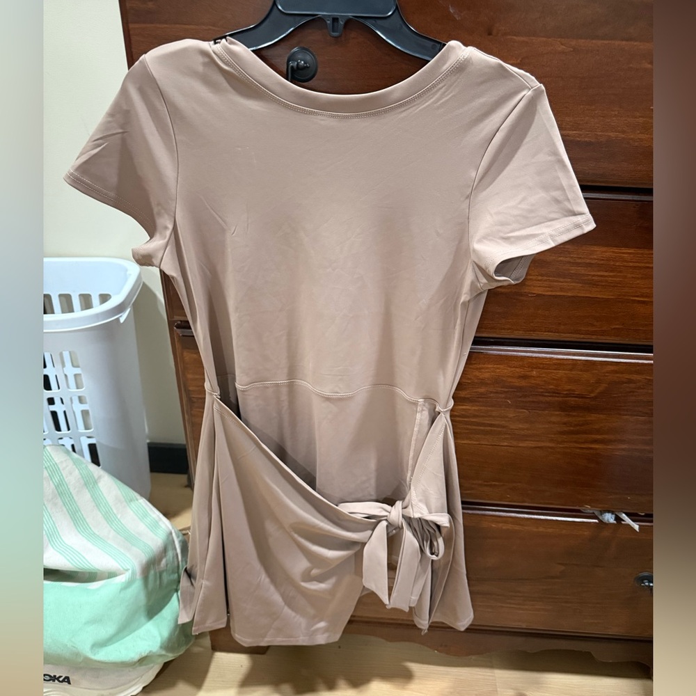 Mocha colored active dress with a tie front
